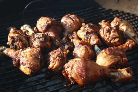 Chicken legs on the Charcoal grill. 